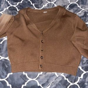Brown cropped sweater.